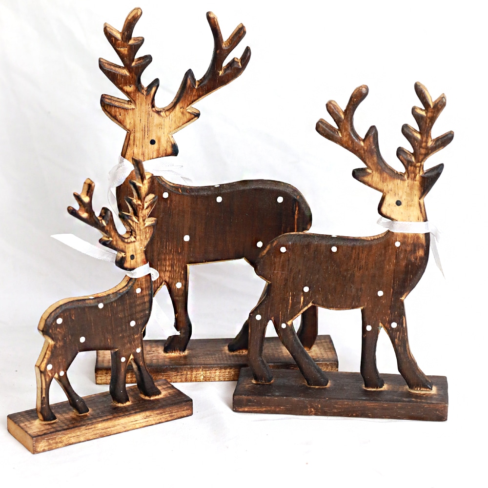 Set aus 3 handgefertigten Rentieren aus Albesia-Holz